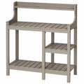 Table de jardinage 110 x 50 x 100 cm en bois taupe avec étagères de rangement